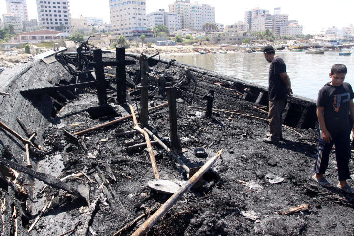 debris of a ship after it was hit by Israeli fire and brought to the port in Gaza City.