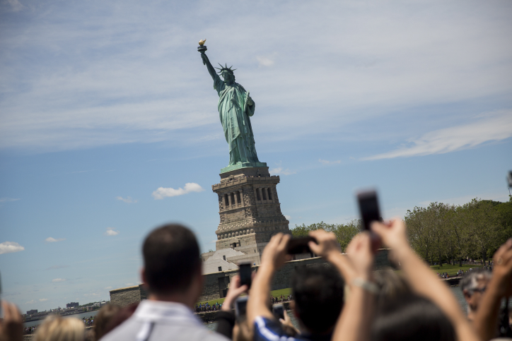 Tourist take pictures of the Statue of Liberty, on Liberty Island in the middle of New York Harbor, in Manhattan, New York City . June 13, 2016. Photo by Yonatan Sindel/Flash90 *** Local Caption *** ??? ???? ????? ????? ????? ??? ??????