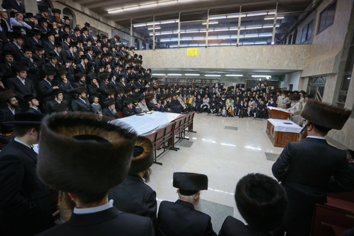 Ultra orthodox jews of the Lelov Hassidic dynasty in the city of Beit Shemesh light a large chanuckia, on the first night of the Jewish holiday of Hanukkah. Hanukkah, also known as the Festival of Lights, is an eight-day Jewish holiday commemorating the rededication of the Holy Temple. The festival is observed by the kindling of the lights of a 'hanuckia'- a nine-branched candelabrum, with one additional light being lit on each night of the holiday. December 24, 2016. Photo by yaakov Lederman/Flash90 *** Local Caption *** ????? ??????? ???? ?????? ??????? ? ?????
