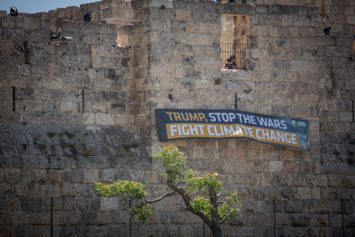 The Tower of David has a large sign saying "Trump, Stop the Wars, Fight Climate Change" in Jerusalem's Old City, on May 17, 2017. The sign was hung by Israeli environmental organizations, ahead of the official visit of USA President Donald Trump to Israel coming up next week. Photo by Hadas Parush/Flash90 *** Local Caption *** ??? ????? ??????? ???? ???? ??? ????? ???? ?? ? ?????? ????? ????? ??????? ??????? ???? ????? ???? ????? ????? ???? ????? ????? ?????? ?????