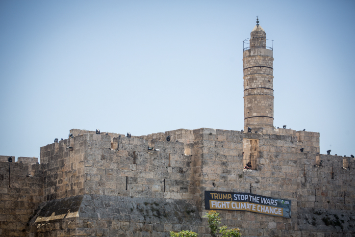 The Tower of David has a large sign saying "Trump, Stop the Wars, Fight Climate Change" in Jerusalem's Old City, on May 17, 2017. The sign was hung by Israeli environmental organizations, ahead of the official visit of USA President Donald Trump to Israel coming up next week. Photo by Hadas Parush/Flash90 *** Local Caption *** ??? ????? ??????? ???? ???? ??? ????? ???? ?? ? ?????? ????? ????? ??????? ??????? ???? ????? ???? ????? ????? ???? ????? ????? ?????? ?????