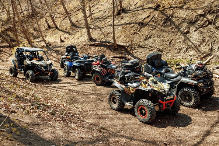 quad-atv-cars-all-terrain-vehicle-parked-mountain-road