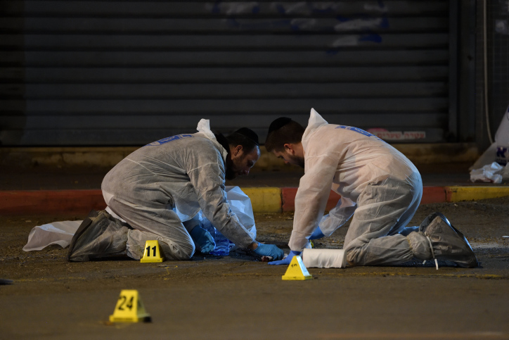 Two police officers were killed and several other people were wounded in a shooting attack in the northern city of Hadera