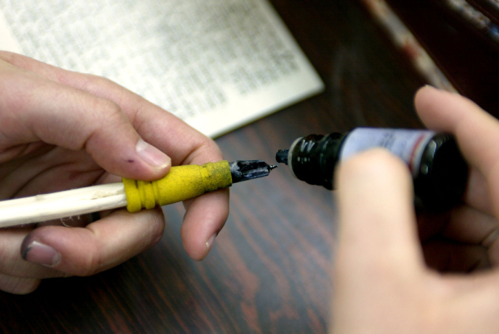 Mezuzot writing in Jerusalem