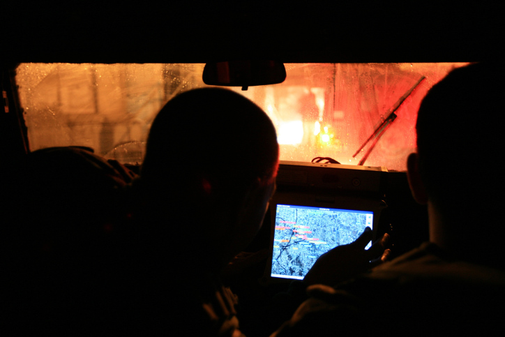 IDF soldiers are breaking into Hamas institutions and confiscating computers and documents, late night in the city of Hebron on the West Bank