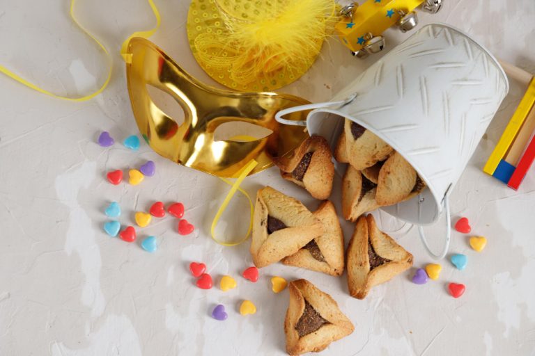 carnival-attributes-raditional-jewish-sweets-hamantaschen-cookies-plate-wooden-background