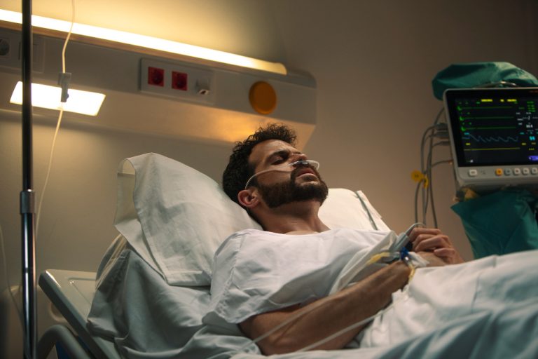 young-man-being-ill-hospital-bed