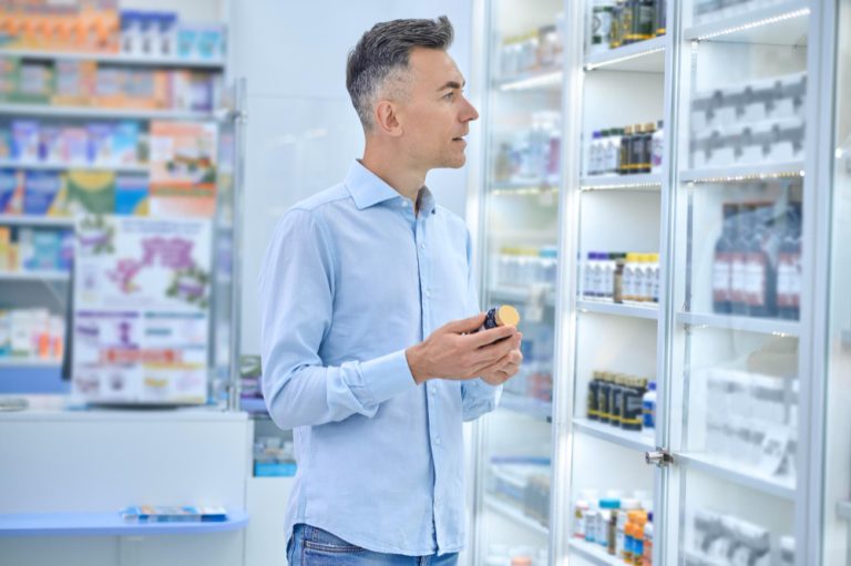 choosing-medicines-man-choosing-medicines-na-drugstore