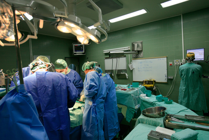 An Israeli medical staff of surgeons and nurses conduct open heart surgery in an Israeli hospital
