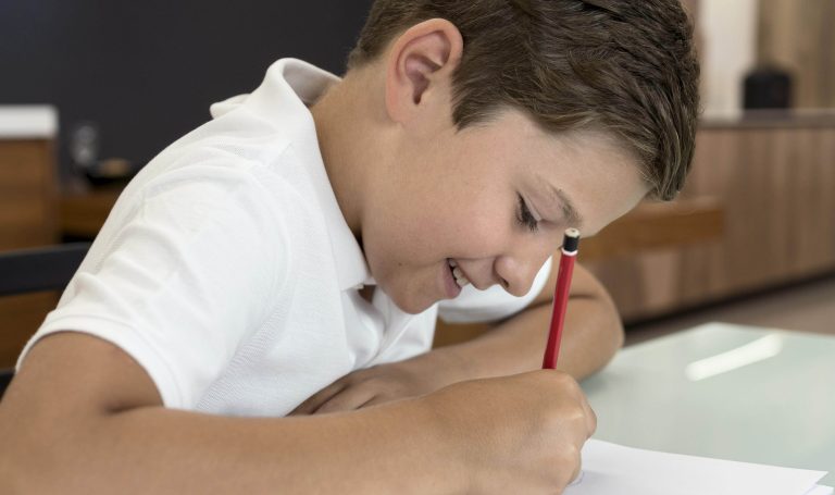 adorable-young-boy-doing-his-homework2