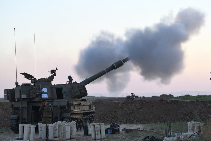 An IDF artillery unit fires towards Gaza Strip near the Israel-Gaza border