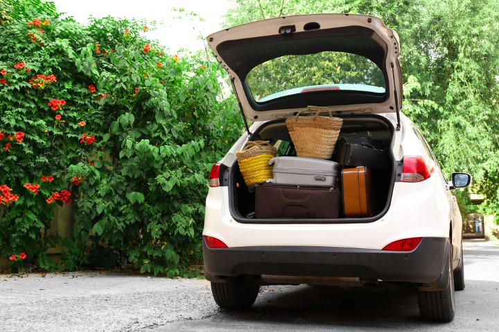 Suitcases,And,Bags,In,Trunk,Of,Car,Ready,To,Depart