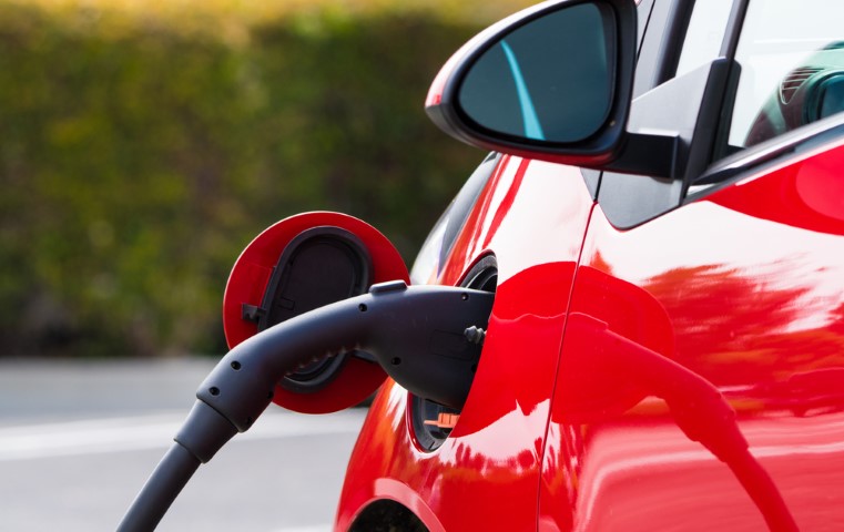 An,Electric,Vehicle,,Car,Charging,At,A,Public,Station