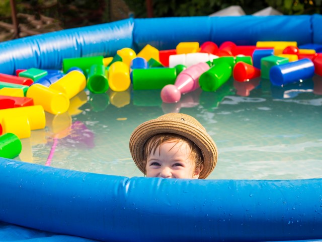 The,Child,Bathes,In,An,Inflatable,Pool
