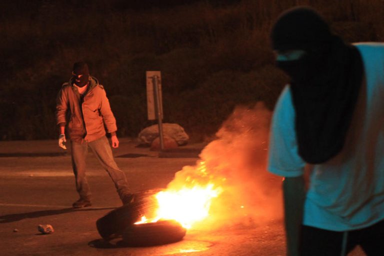 Settlers attack Palestinians after West Bank outpost evacuation protest