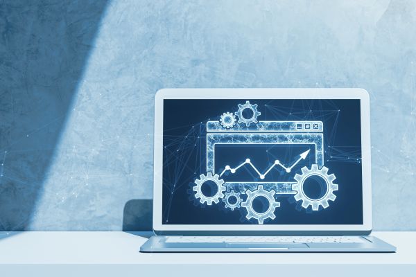 close-up-laptop-table-with-digital-folder-with-cogs-mesh-arrows-blurry-backdrop-project-management-icon-data-management-folder-project-goals-task-management-concept-3d-rendering