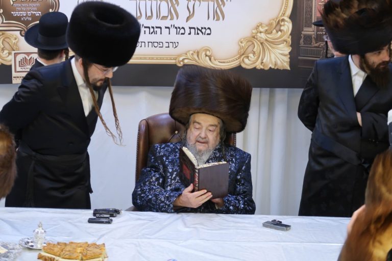 מ