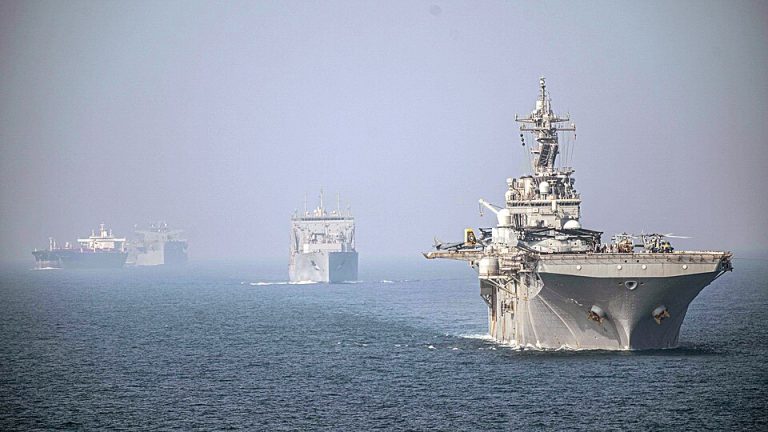 USS_Essex_(LHD_2),_right,_and_USNS_Wally_Schirra_(T-AKE_8)_transit_the_Strait_of_Hormuz_in_formation