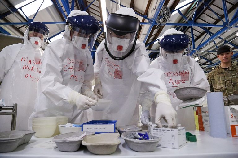 Medics_from_across_the_NHS_practise_in_full_Personal_Protective_Equipment_(PPE)_(15649499108)
